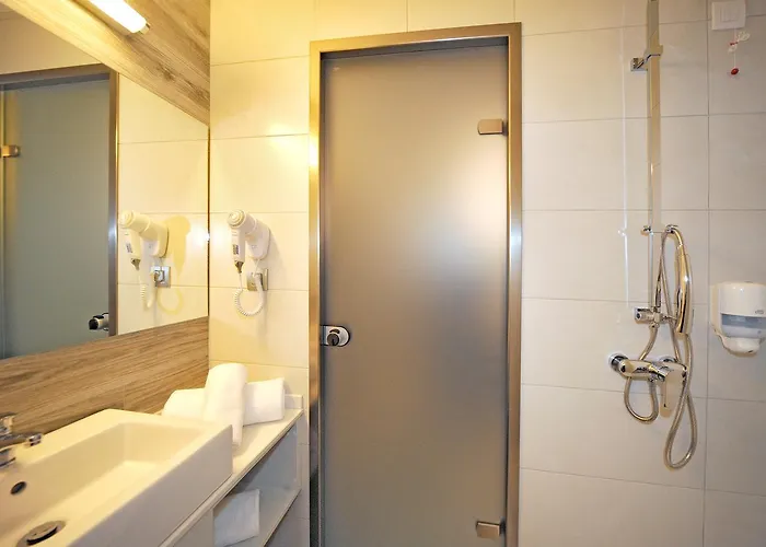 Astron & شقة فندقية